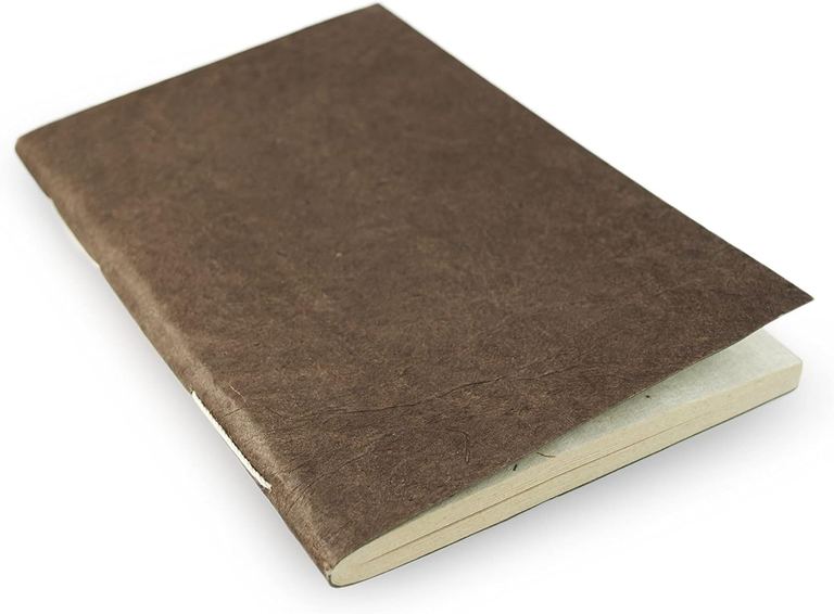 The Medium Dark Walnut Nepali Companion notebook, its sewn spine and lokta pages showing